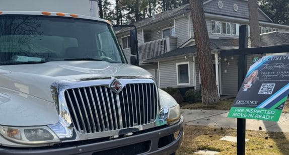 Moving truck parked outside Rockstar Moving Company for local relocation services.